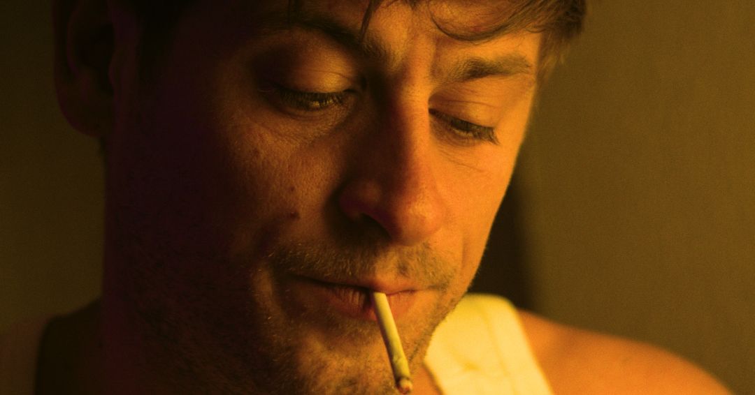 The Redeemer — close-up with cigarette