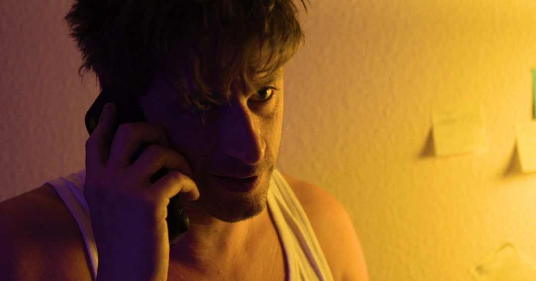 The Redeemer — phone call close-up